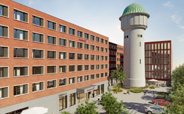 In Karlsruhe starten Projektentwickler TIMONGRUPPE und Betreiber Premier Inn mit dem Richtfest die letzte Bauphase für ein 199-Zimmer Hotel direkt am Hauptbahnhof